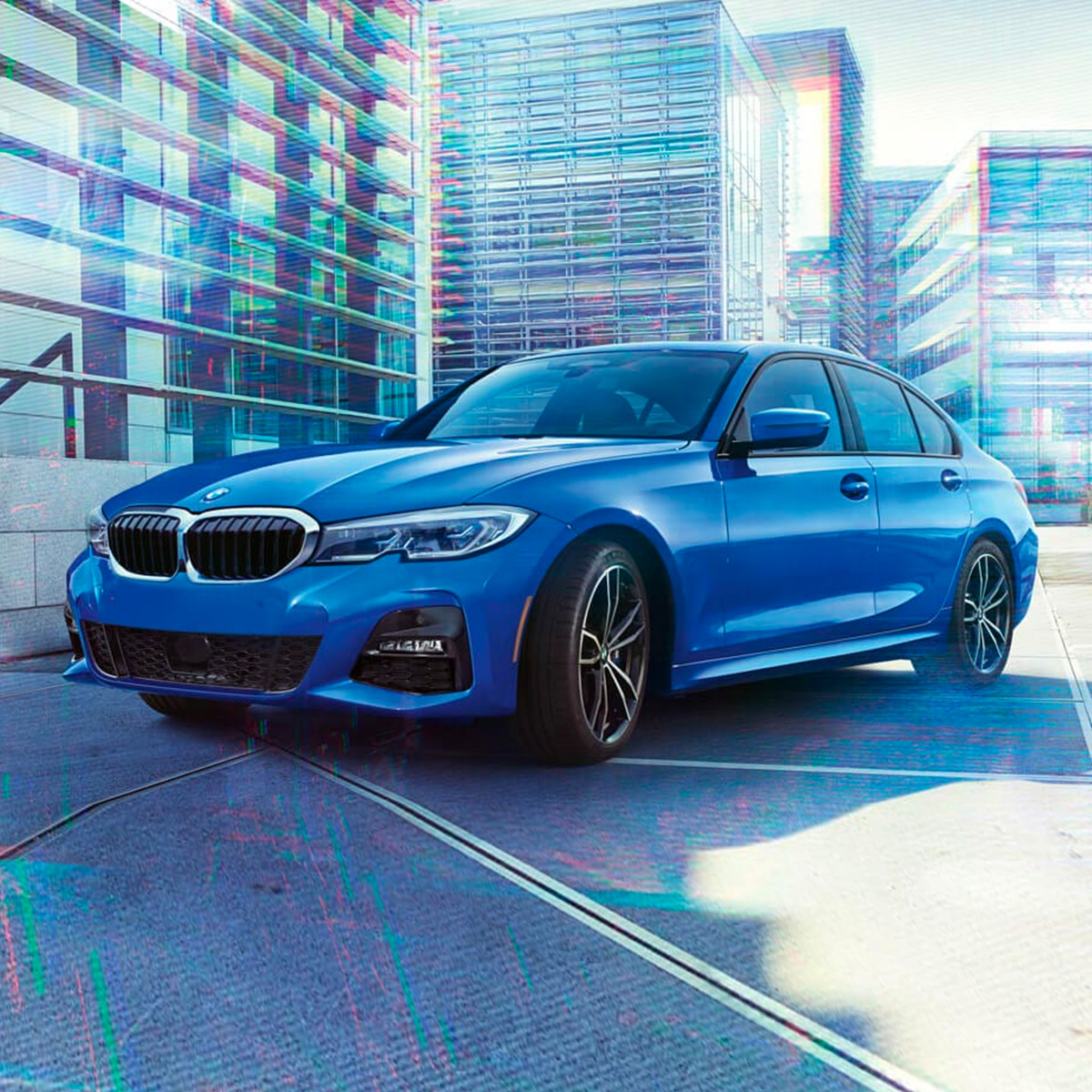 Profile view of blue 2021 BMW 3 Series on city street