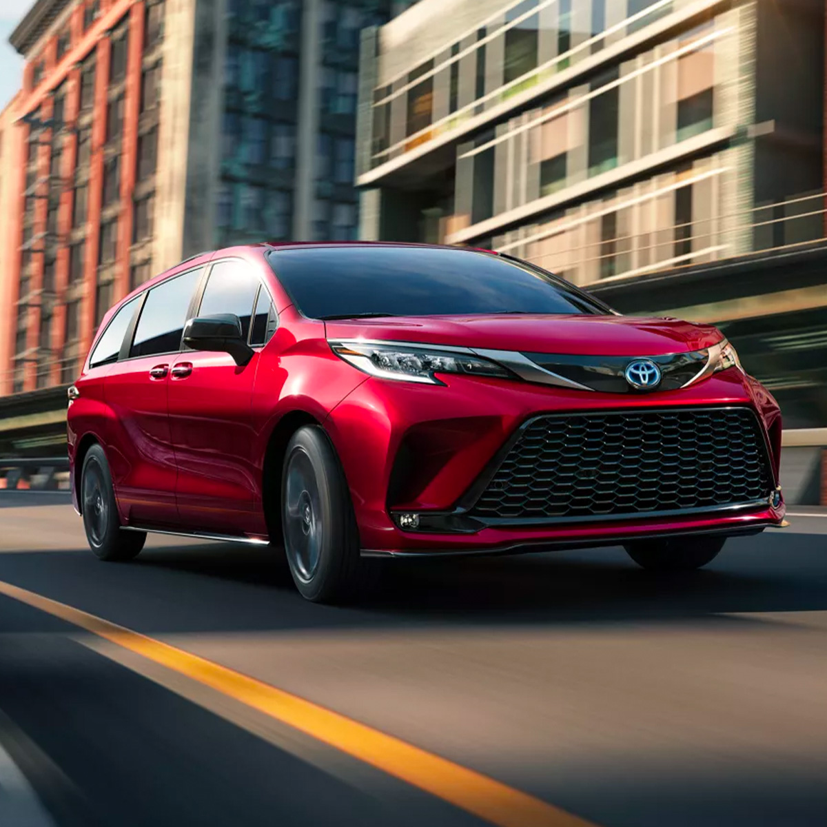 2022 Toyota Sienna driving through the city